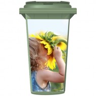 Young Girl Sniffing A Sunflower Wheelie Bin Sticker Panel